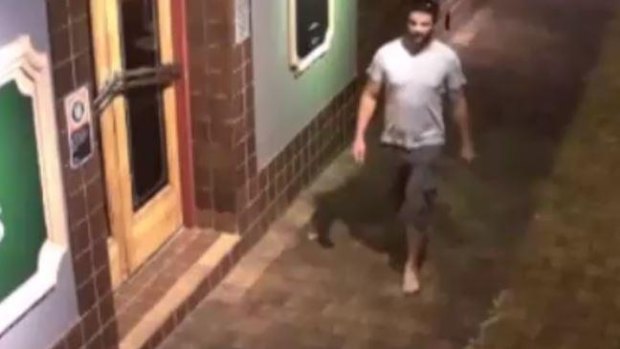 CCTV footage of Morgan Huxley walking barefoot outside The Oaks in Neutral Bay at 1.32am on September, 8, 2013.