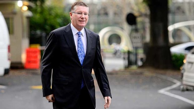 Under pressure: Premier Denis Napthine outside Parliament on Tuesday morning.