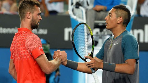 Thriller: Benoit Paire of France shakes hands with Nick Kyrgios.