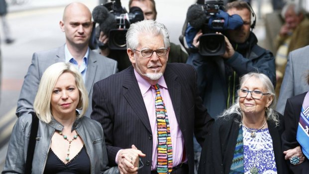 Entertainer Rolf Harris arrives with his daughter Bindi (left) and wife Alwen Hughes at Southwark Crown Court in London.