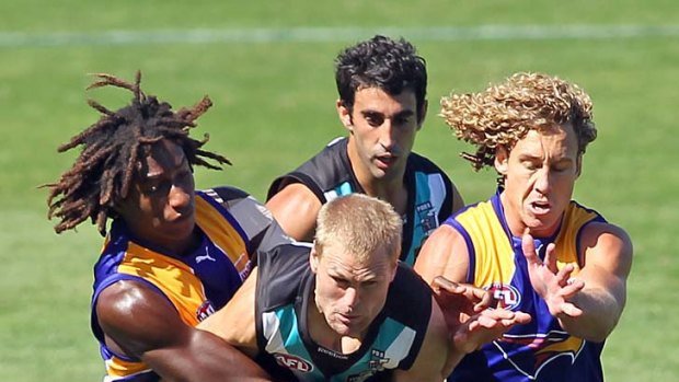 On the outer: Port Adelaide's Kane Cornes will sit out tonight's showdown against the Crows.