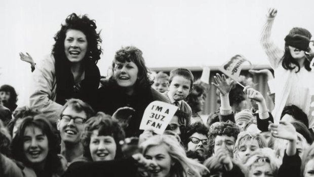 Melbourne fans greet the Beatles at Essendon Airport in June 1964.