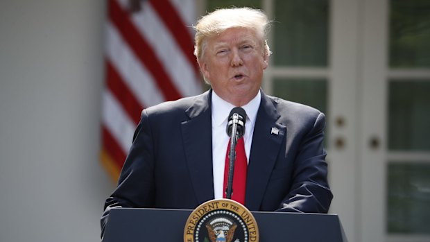 President Donald Trump announcing the US was withdrawing from the Paris deal. 