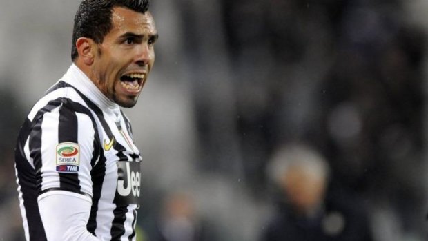 Carlos Tevez celebrates after scoring for Juventus against Parma.