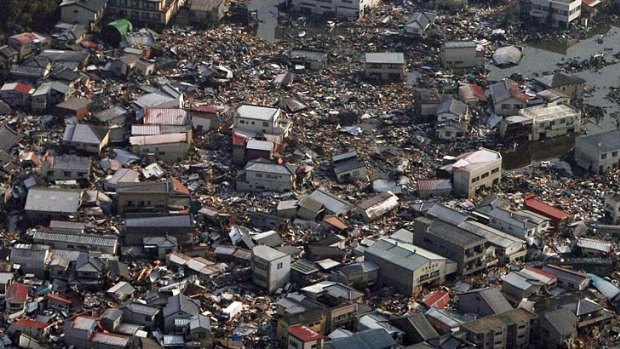 Collapsed houses and debris  in Kesennuma city, Miyagi prefecture, in the wake of the tsunami in Japan.