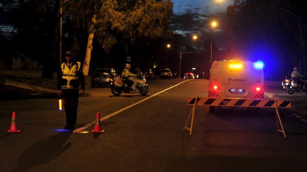 Police on the scene of a fatal pedestrian incident in Mawson.