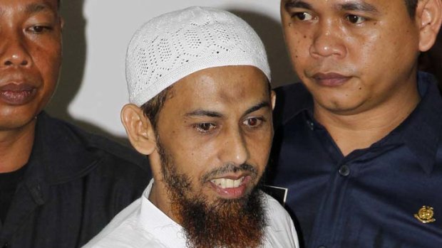 Multiple charges &#8230; Umar Patek arrives at court yesterday to face trial for his alleged role in the murder of 202 people in the Bali bombings in 2002.