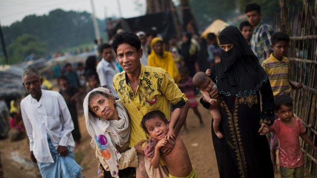 Exhausted Rohingya arrive at Kutupalong refugee camp in Bangladesh. 