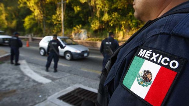 Mexican authorities were seeking an Australian citizen in connection with orchestrated bombings, Mexican media reported.