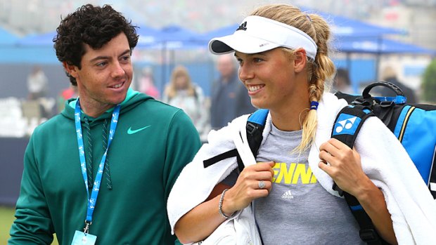 Rory McIlroy and Caroline Wozniacki on the practice court at the AEGON International tennis tournament in Eastbourne in June.