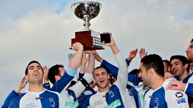 Champions ... Sydney Olympic celebrate after winning the 2011 Premier League Grand Final against Sydney United at Belmore oval in front of more than 10,000 spectators.