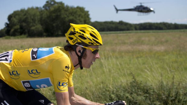 Still the one ... overall leader Bradley Wiggins takes on one of the few faster machines in the Tour de France.