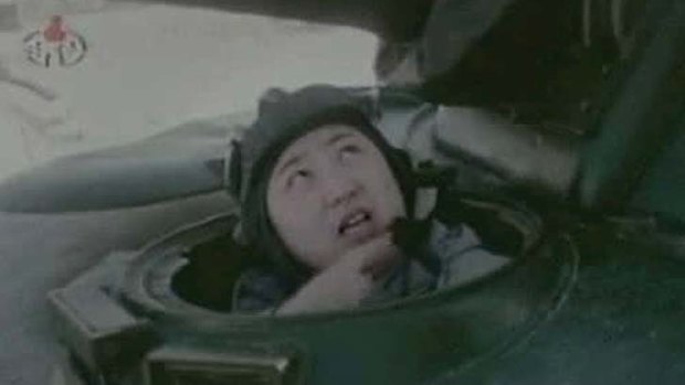 Driving a tank ... Kim Jong-un.