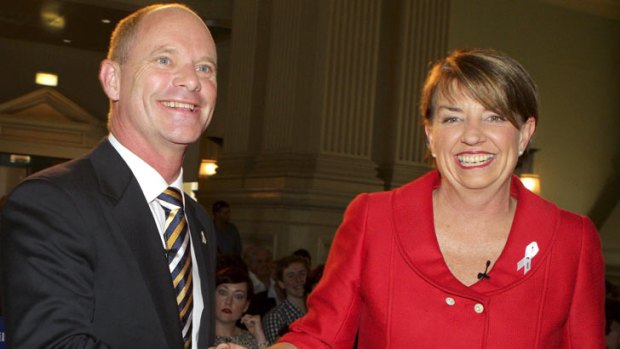 Anna Bligh and Campbell Newman sharing an increasingly rare cordial moment last year.