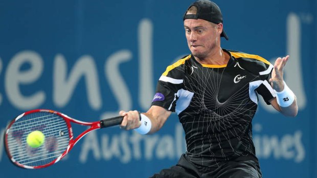 Lleyton Hewitt plays a forehand during his match against Igor Kunitsyn.
