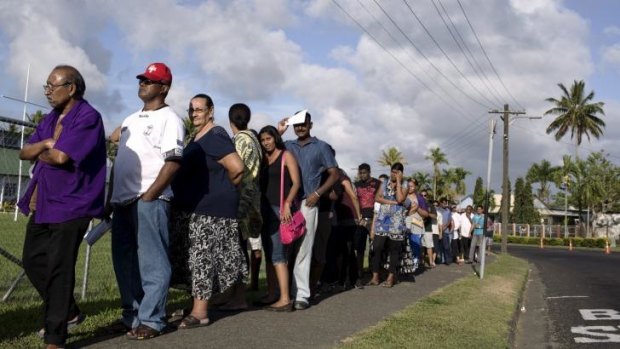 Native Fijians and ethnic Indians queued together to vote.