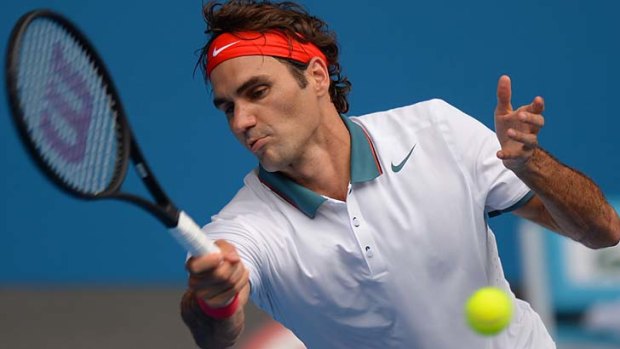 Roger Federer plays a forehand during his men's singles match against Russia's Teymuraz Gabashvili on Saturday.