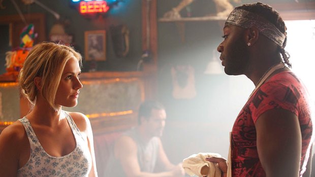 Anna Paquin as Sookie Stackhouse and Nelsan Ellis as Lafayette Reynolds in a scene from True Blood.