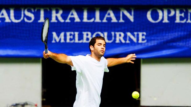 Pete Sampras hits up on centre court at Rod Laver Arena.