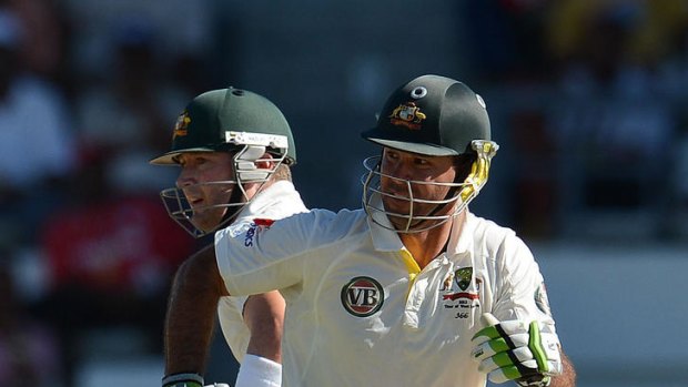 Australian batsmen Ricky Ponting (right) and Michael Clarke make a run.