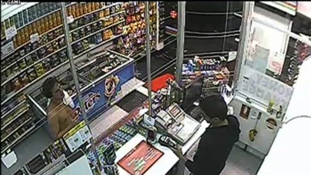 Roberto Curti captured on CCTV in a convenience store on the night of his death.