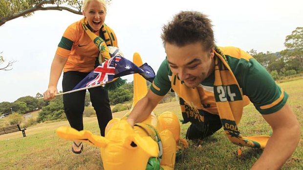 Socceroos fans Luke and Summa Wilby of Drummoyne, are spending up to $40,000 on their World Cup trip.
