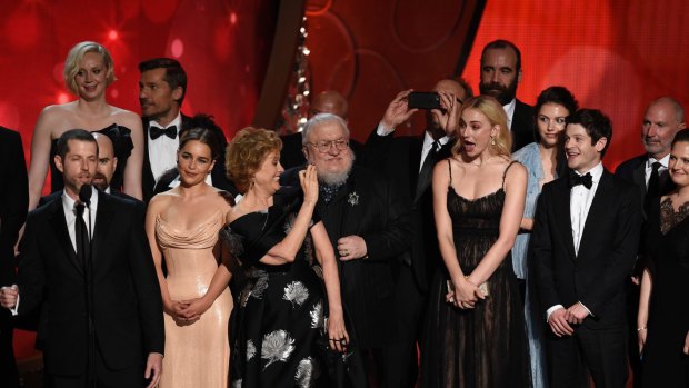 The cast and crew from Game of Thrones accept the award for outstanding drama series at the Emmy Awards in September.