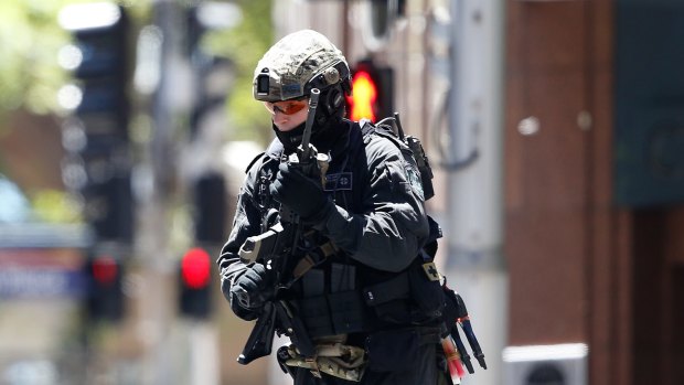 Two officers fired 22 rounds at gunman Man Haron Monis. 
