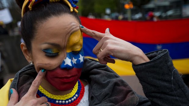 Human rights activists protest against the current situation in Venezuela outside the World Court, United Nations' highest judicial organ in The Hague, Netherlands in April.