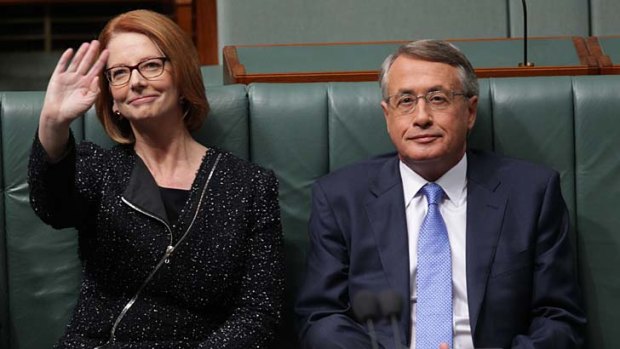 Waving goodbye to the baby boom: Prime Minister Julia Gillard and Treasurer Wayne Swan delivered a budget that slashed the baby bonus.