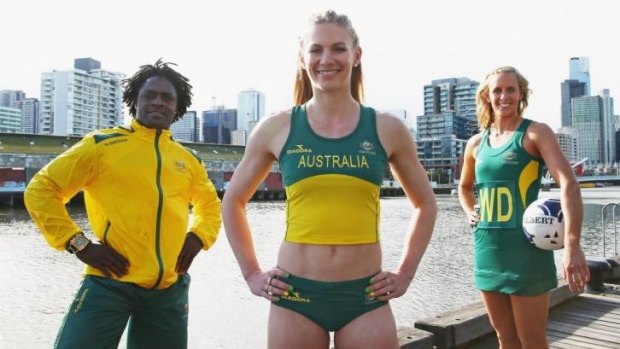 Francois Etoundi (weightlifting), Melissa Breen (athletics) and Renae Hallinan (netball) during the unveiling of the Australian Commonwealth Games uniform on Monday.