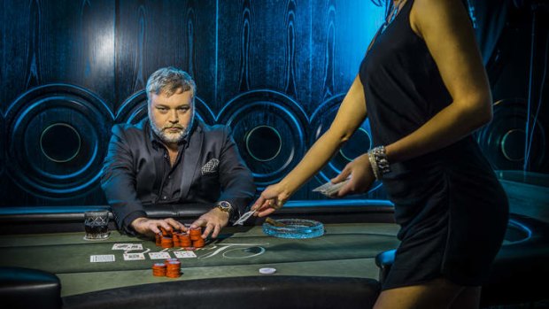 What a card … Kyle Sandilands in poker-playing, whisky-drinking, hard-man mode.