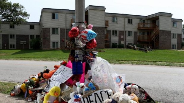 A memorial for Michael Brown near the spot where he was shot by police.