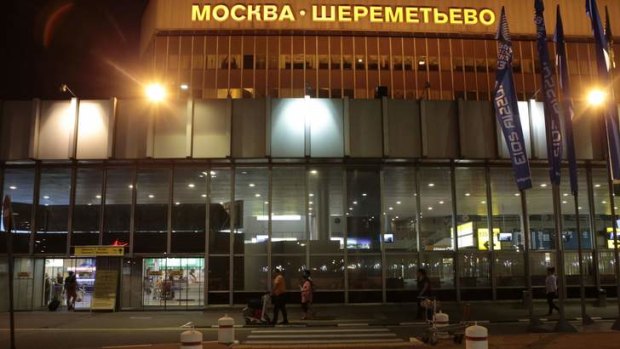 People walk outside the entrance of Moscow's Sheremetyevo airport. Edward Snowden was in the transit area.