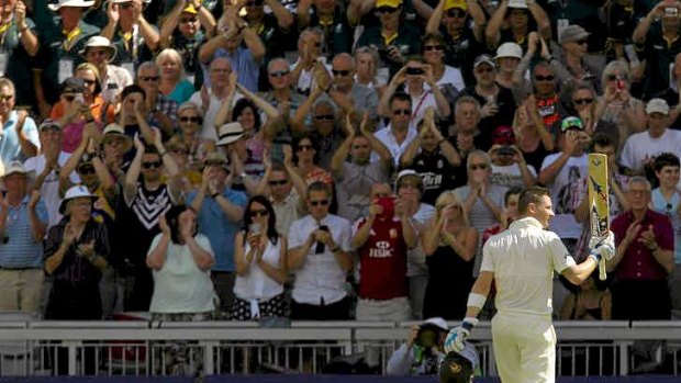 Australia captain Michael Clarke raises his bat to the applause of the crowd after posting his highest score in an overseas Test.