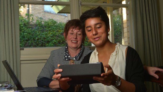 PLC student Sophie Chauhan checks through  Anna Burke's emails as part of her work experience with the federal Labor MP. 