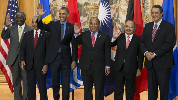 US President Obama in Paris on December 1 with, from left, the Prime Minister of Barbados Freundel Stuart, President Anote Tong of Kiribati, Obama, President Christopher Loeak of the Republic of the Marshall Islands, Prime Minister Peter O'Neill of Papua New Guinea, and Prime Minister Kenny Anthony of St Lucia.