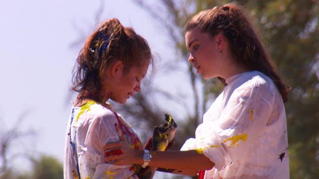 A teary Ashley confides in fellow contestant Shannon.