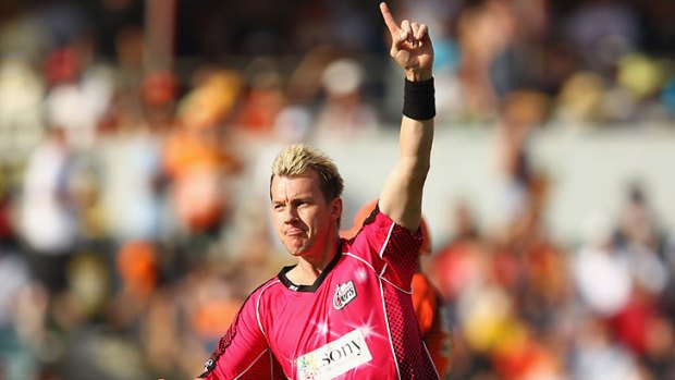 Brett Lee celebrates after claiming the wicket of Perth Scorchers opener Herschelle Gibbs from the first ball of the match.