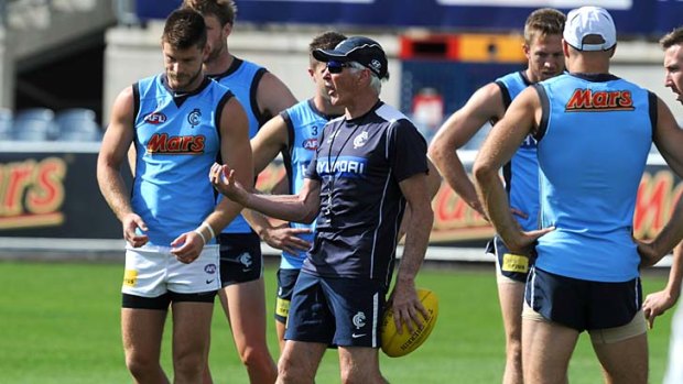 Mick Malthouse encourages his players to grab their opportunity against the Tigers.