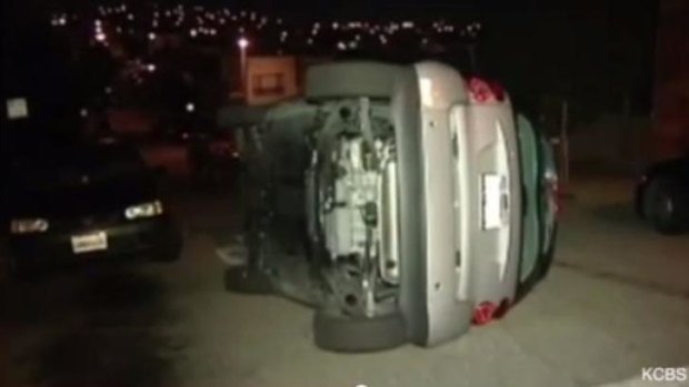 One of three Smart cars that were tipped over by vandals in San Francisco on Sunday night.