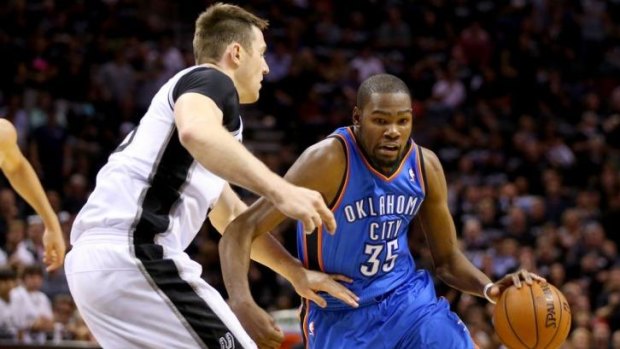Australian Aron Baynes tries to stop Oklahoma's Kevin Durant during game one of the Western Conference finals.
