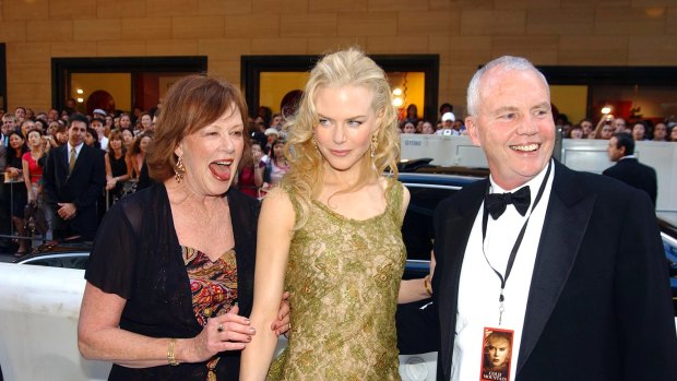 Close-knit: Nicole Kidman, centre, with her mother Janelle and father Antony, who died in 2014.