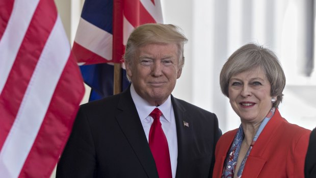 President Donald Trump with Prime Minister Theresa May on Friday.