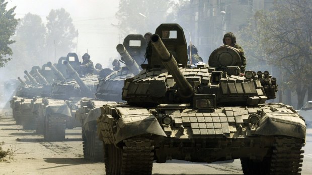 Russian tanks drive through Tskhinvali, the regional capital of Georgia's breakaway province of South Ossetia, moving to the Russian border in 2008.