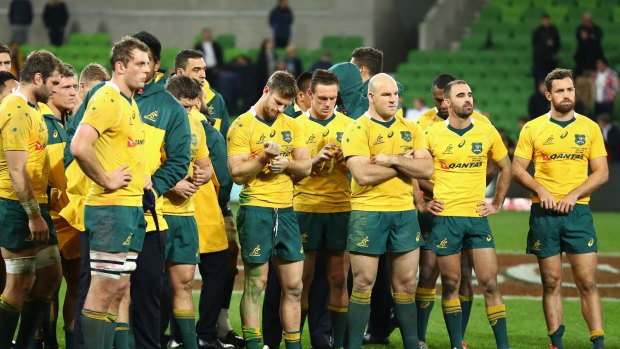 Dejected: Wallabies captain Stephen Moore and his teammates lost the Test series in Melbourne.