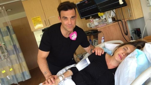 Robbie Williams and his wife, Ayda Field, during her 14-hour birth with their second child.