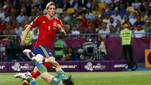 Goal ... Spain's Fernando Torres scores.