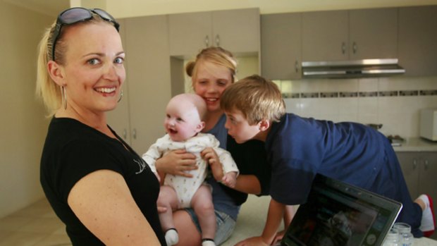 Stacey Currie with three of her children: Toby, four months, Tahlia, 10, and Jack, 8.