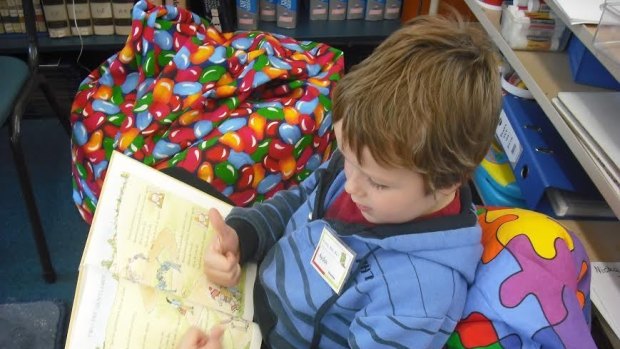 A pre-prep student gets a feel for his early education, especially literacy.